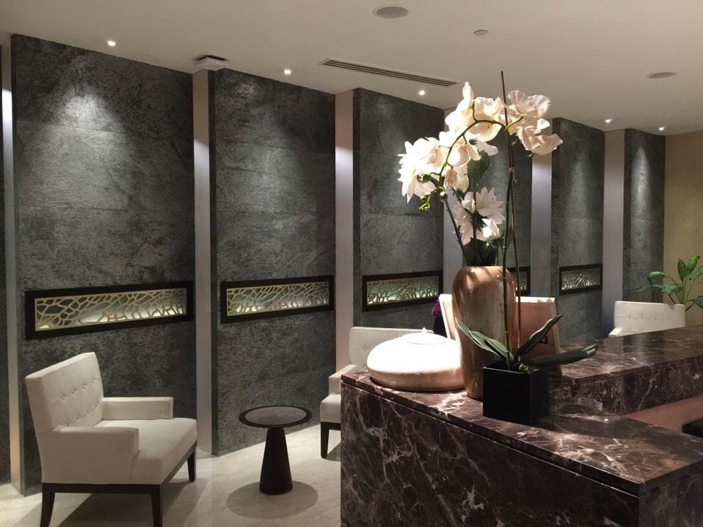 Expansive open-plan living space with tropical plants